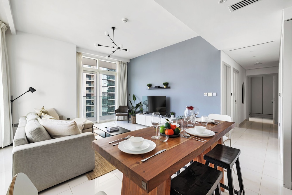 2BR Beachfront Retreat with Palm Views