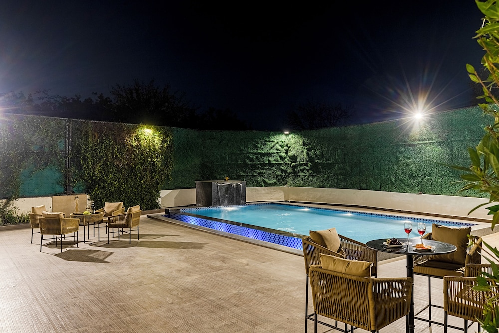 ELIVAAS Ibiza Luxe 4-BHK Farmhouse