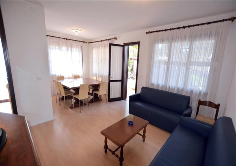 Wide row House With Private Fenced Garden for 9 Guests in Lignano Pineta