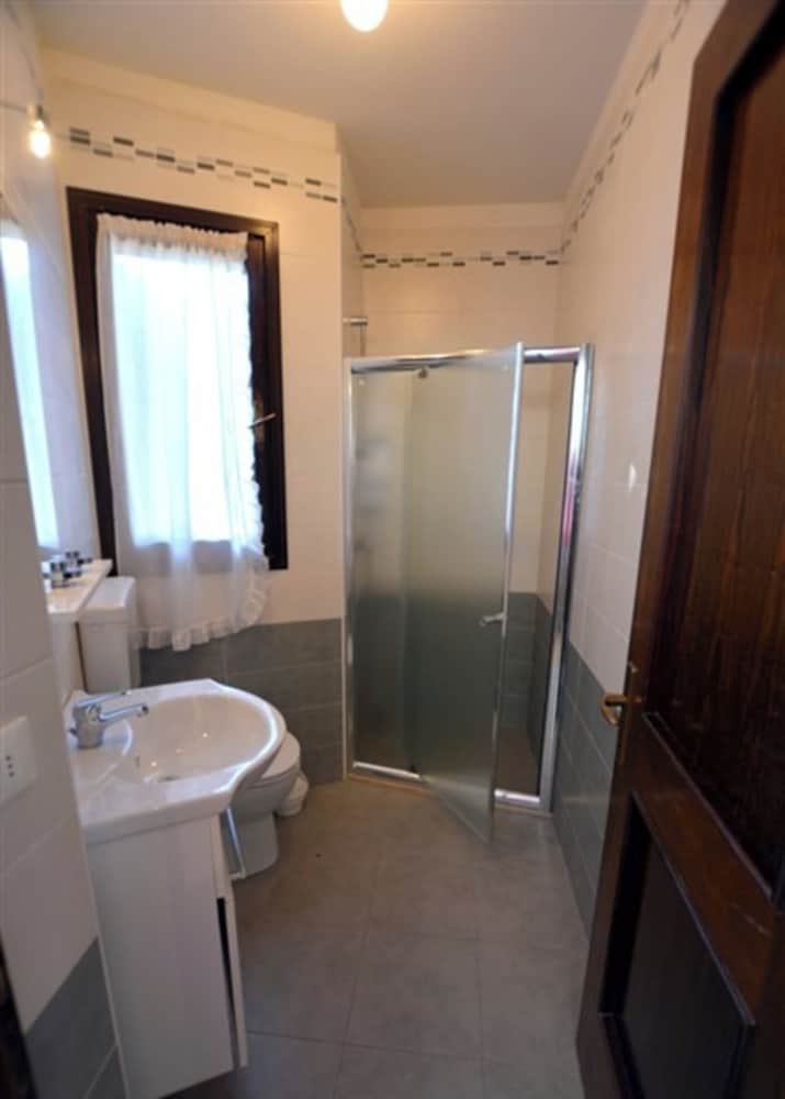Wide row House With Private Fenced Garden for 9 Guests in Lignano Pineta