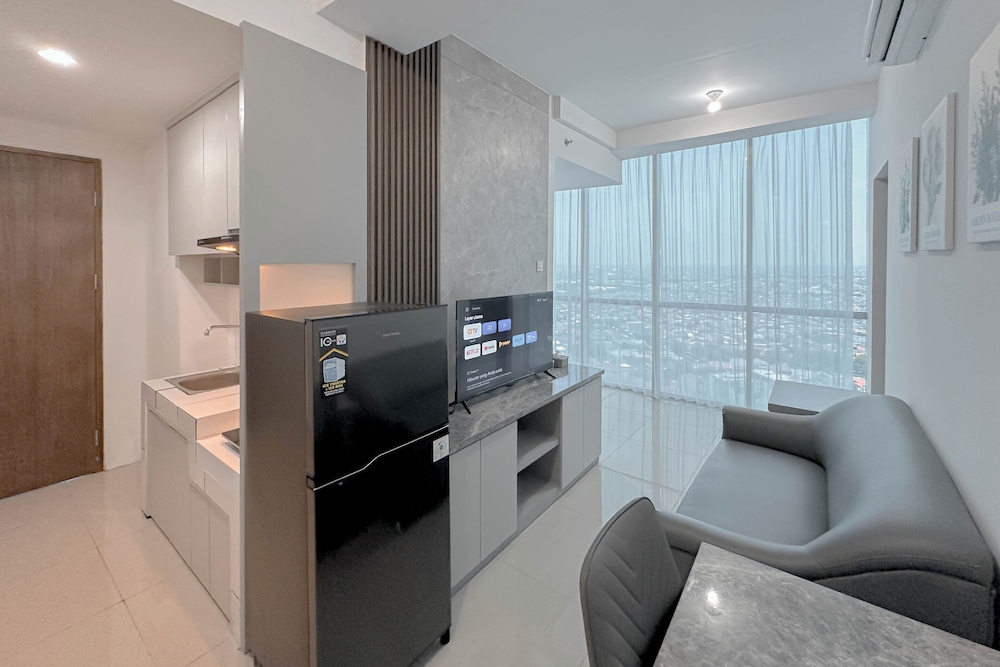 Combined Grey Toned 2Br Apartment At The City Square Surabaya