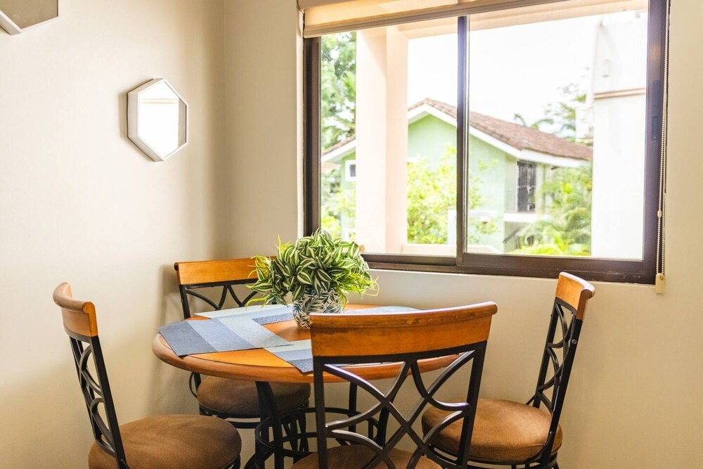 Cozy Condo with Panoramic Hillside Views from Rooftop Terrace and Short Walk to Beach