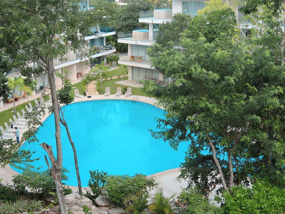 Stylish Playacar Condos w Balcony & Pool