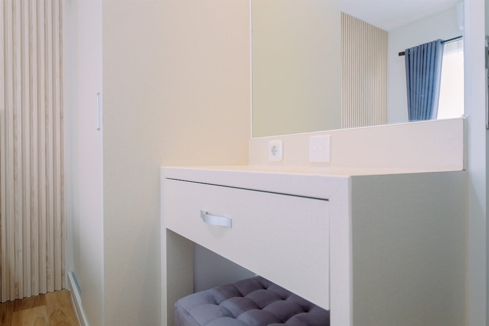 Restful and Modern 2BR at Sentul Tower Apartment