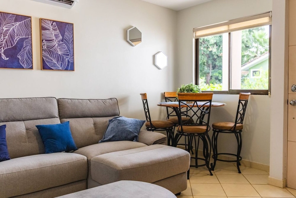 Cozy Condo with Panoramic Hillside Views from Rooftop Terrace and Short Walk to Beach