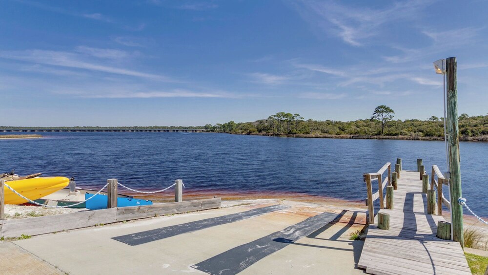 Beachfront Charm Meets Lake Life + Free Tickets: Dolphin Cruise & More!