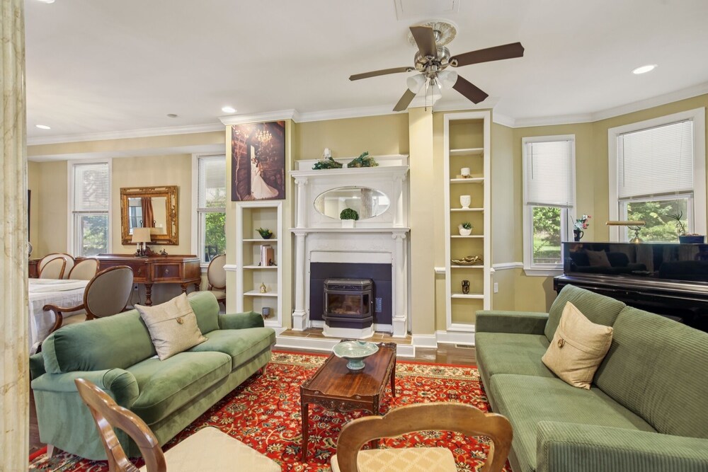 Charming Victorian Home With Porch & Large Yard 7 Bedroom Home
