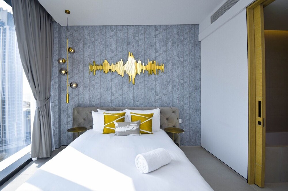 Private Beach in a Bnbme Designer Apartment