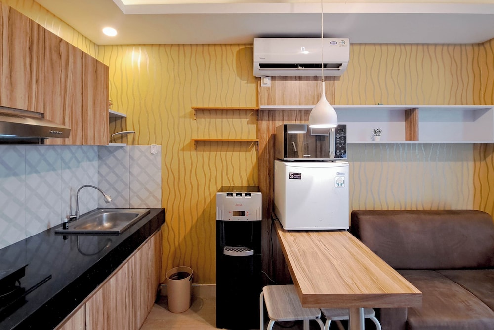 Wooden Accent 2Br At Mekarwangi Square Cibaduyut Apartment