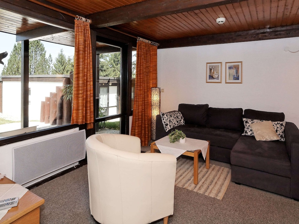 Detached Chalet with Terrace near Swimming Lake view 4