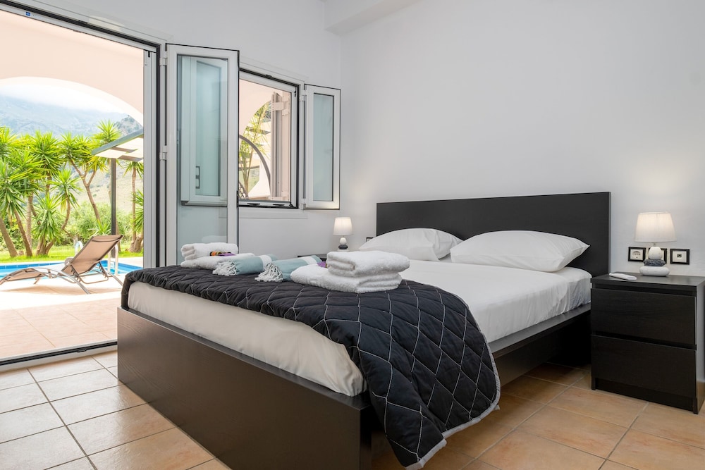 Kournas-sleeps8-parking-garden-pool-petfriendly view 3