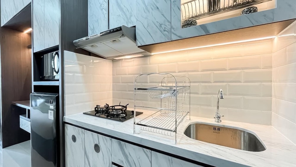 Earth Tone Studio Apartment At Transpark Bintaro