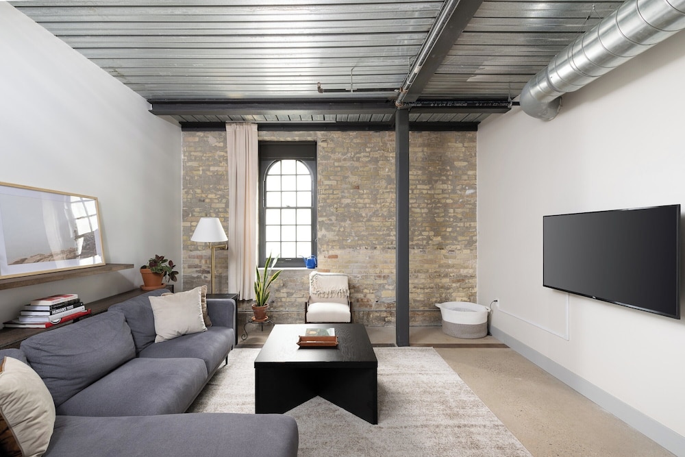 Brewery District Apartment Near Fiserv with Rooftop, Gym, and Parking