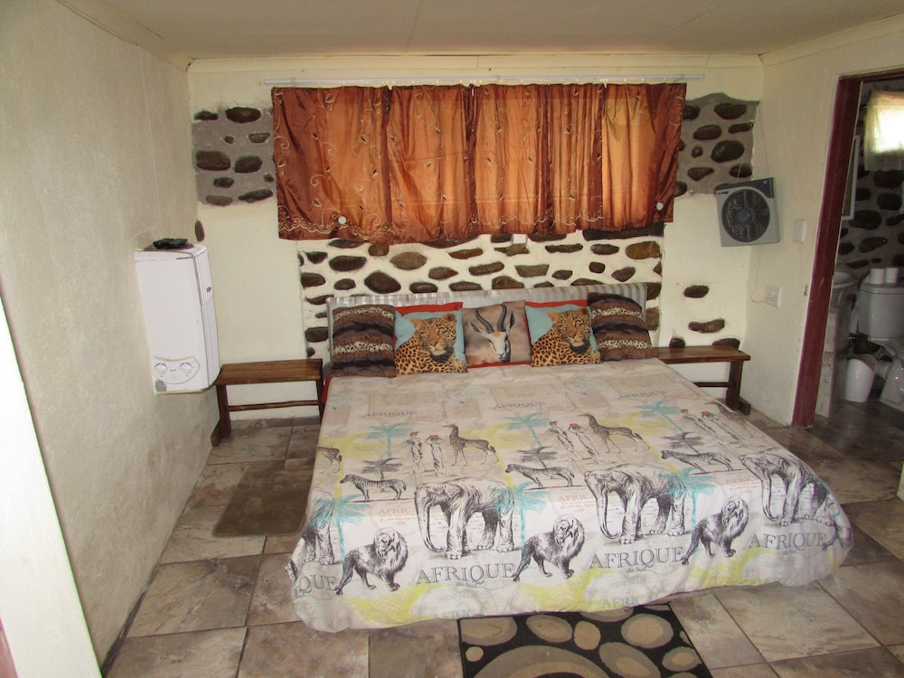 Amazing Tree in Lounge Eco Apartment With Leopards Passing by at Night view 3