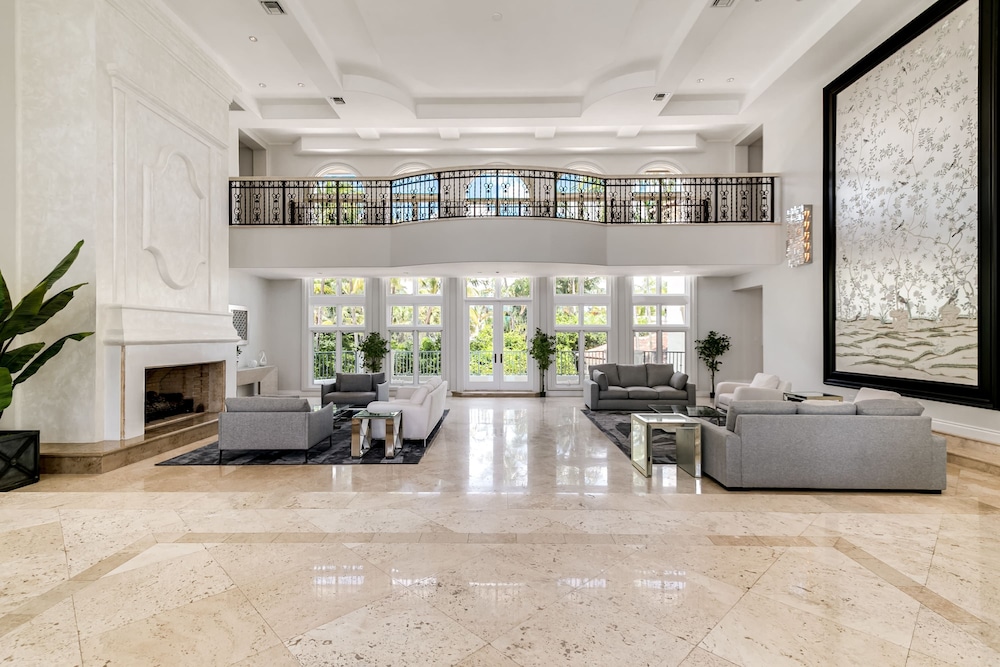 Waterfront Mansion With Game Room Gym Media Room and Guest House