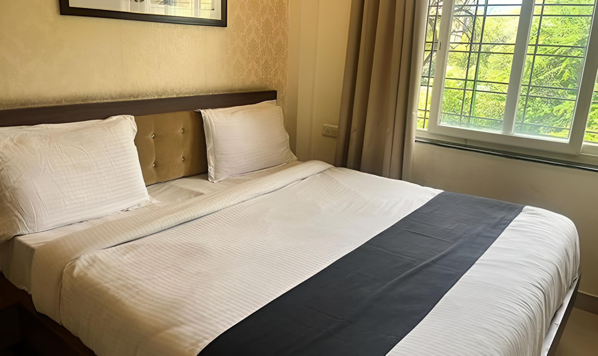 Fabhotel Prime Golden Feather