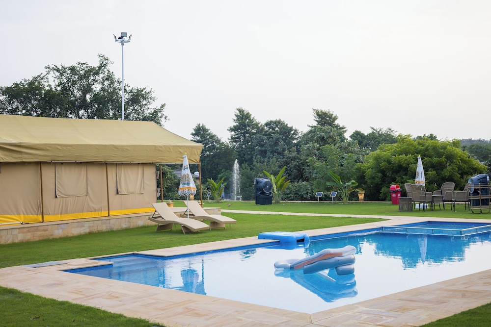 ELIVAAS 5-BHK with Luxe Mudhouses, Tents, Pond & Pvt Pool | Kaimalgarh Farmstay