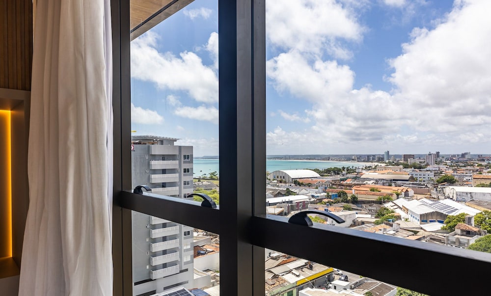 NWTs - Estúdios com Vista Lateral Mar