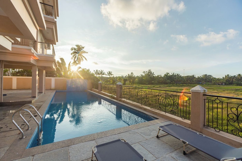 Palm Retreat 1BHK Pool & Field Views