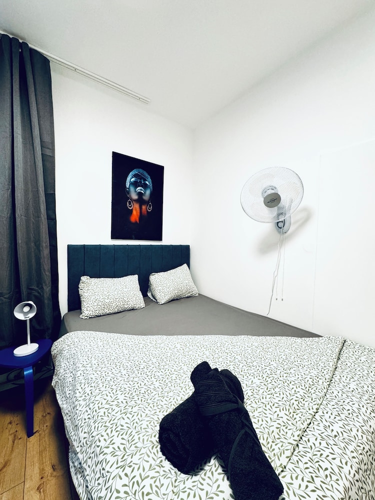 Central 8BR Stay with Garden and Terrace