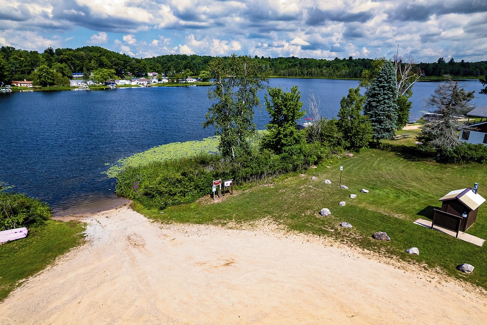 Waterfront Retreat w/ Dock & Yard in Reed City!