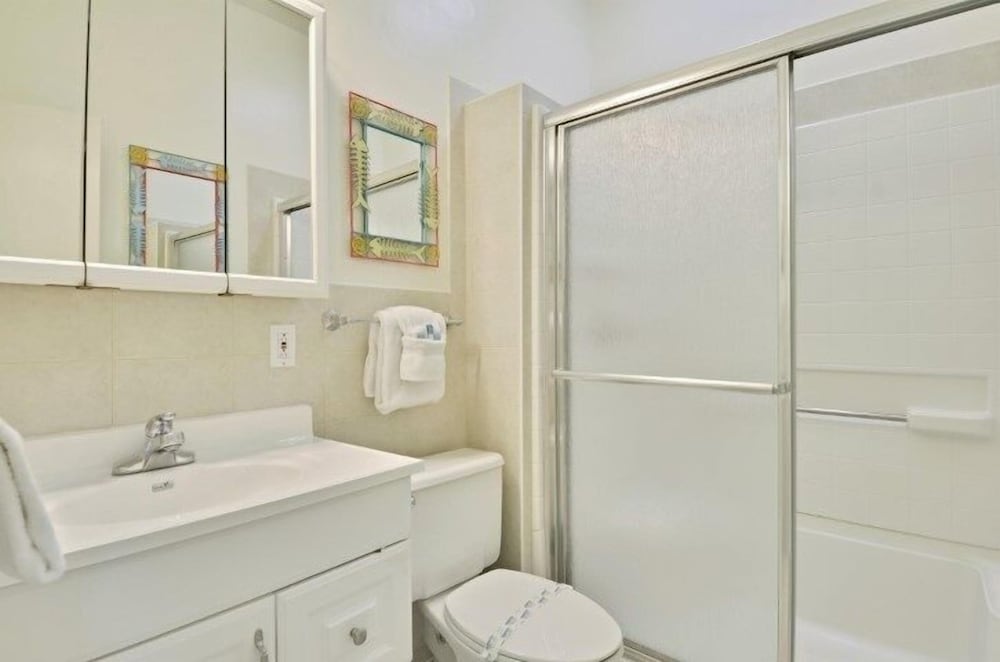 Complete Duplex On Gated Bayfront Property 4 Bedroom Apts by RedAwning