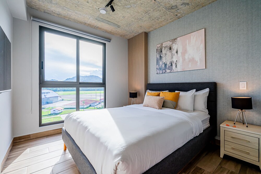 w Elegant 2BR Apartment in the Heart of Centriqo