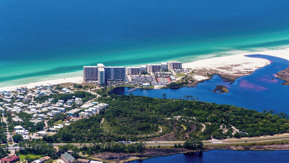 Beachfront Charm Meets Lake Life + Free Tickets: Dolphin Cruise & More!