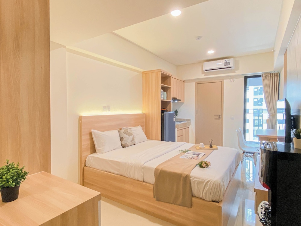 Warm Minimalist Studio Apartment Near Paramadina University At Meikarta