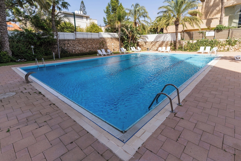 Modern Gem with Stunning Balcony by Sea N Rent