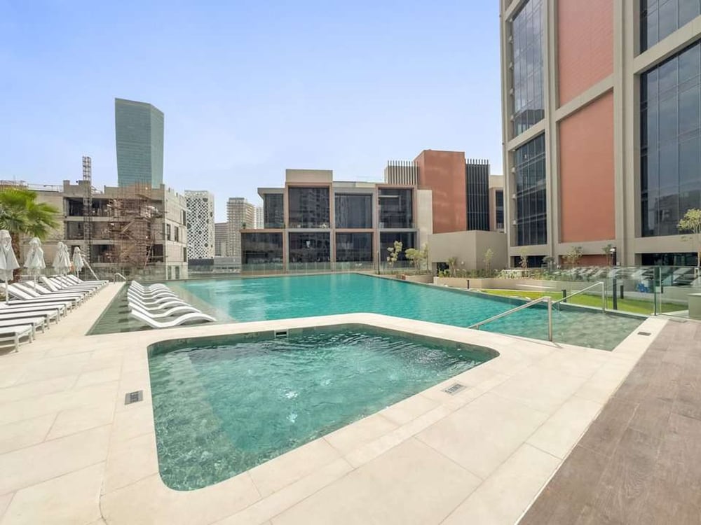 Luxury Living in Peninsula Five With Skyline View and Amazing Pool