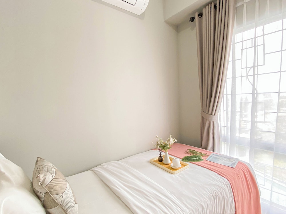 Homey And Modern 2Br At Patraland Urbano Apartment