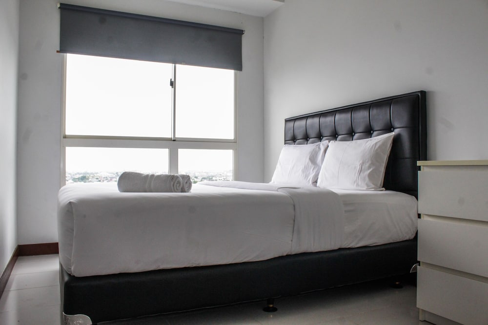 Minimalist and Comfy 1BR Apartment Scientia Residence view 4