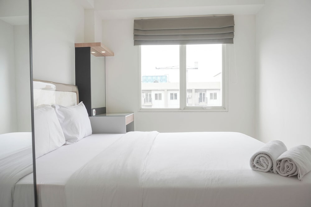 Homey and Minimalist 2BR at Podomoro Golf View Apartment