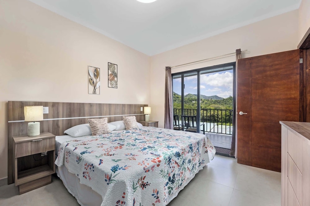 Modern Home with Lush Mountain Views and Spectacular Shaded Terrace in Private Gated Community