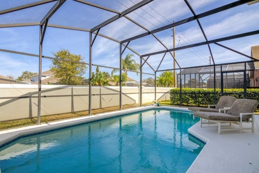 Southern Comforts Of Private Pool Gated 4 Bedroom Home by RedAwning view 3