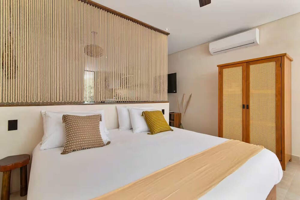 Guest INN Home - Elements Suites