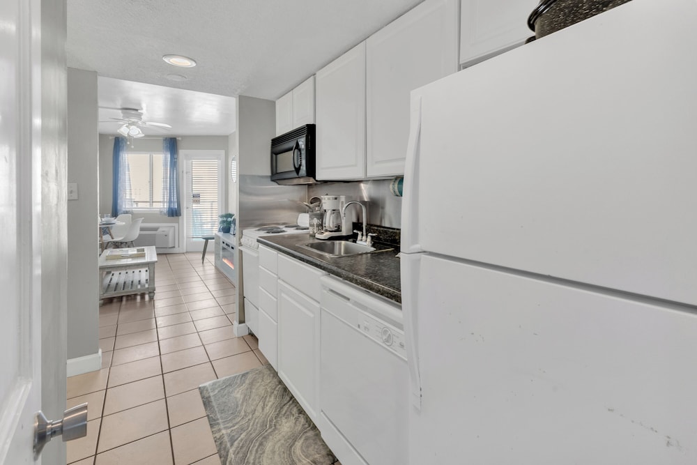 Beachfront Haven 1BR Condo with Balcony