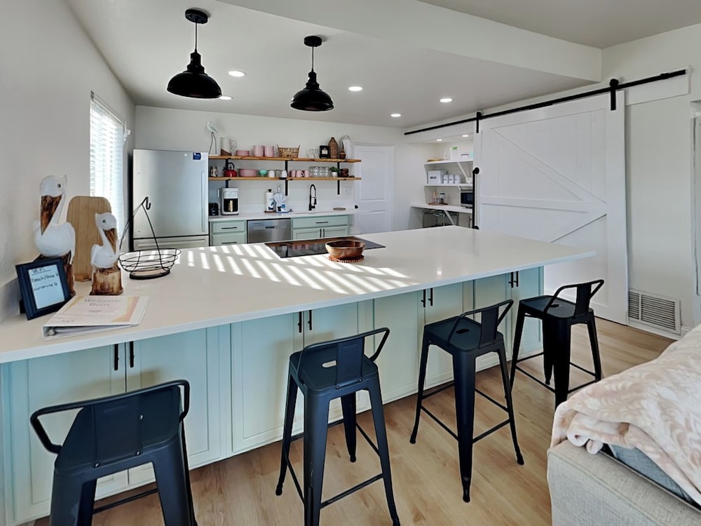 Bathing Suit Beach Bungalow by Distinctive Beach Rentals