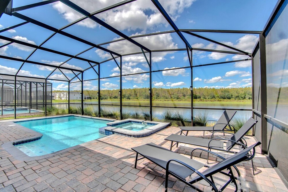 Serenity Lakeview Retreat Stunning Water Views, No Rear Neighbors, Private Pool, Game Room & Star Wars Cinema