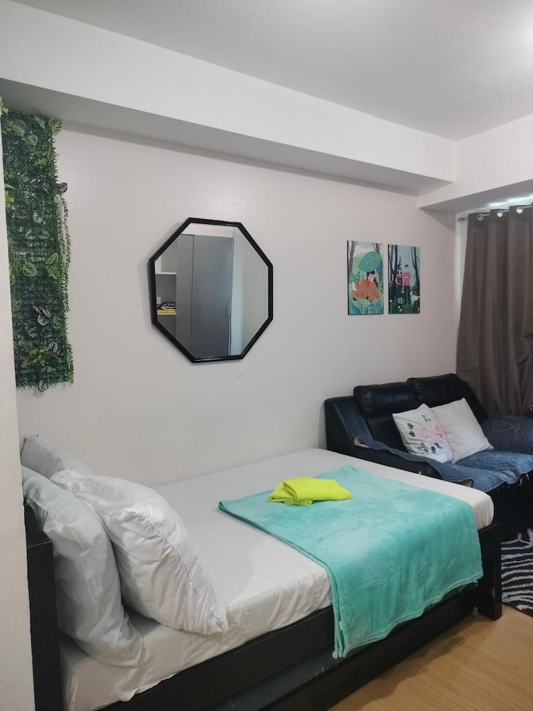 Cozy City View Condo in Quezon City - Your Home Away From Home