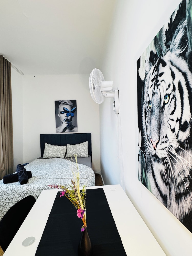 Central 8BR Stay with Garden and Terrace