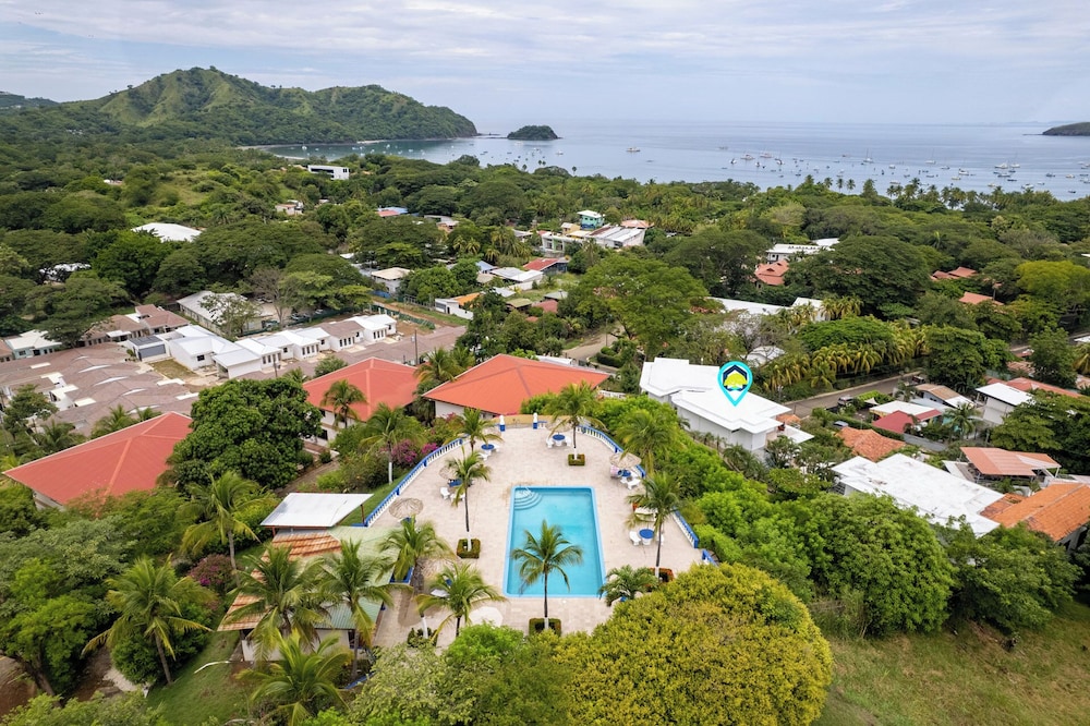 Modern Top-Floor Condo with Panoramic Views and Community Pool