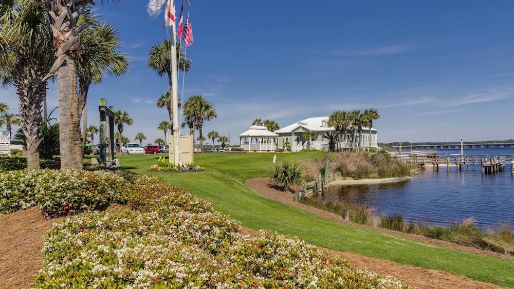 Beachfront Charm Meets Lake Life + Free Tickets: Dolphin Cruise & More!