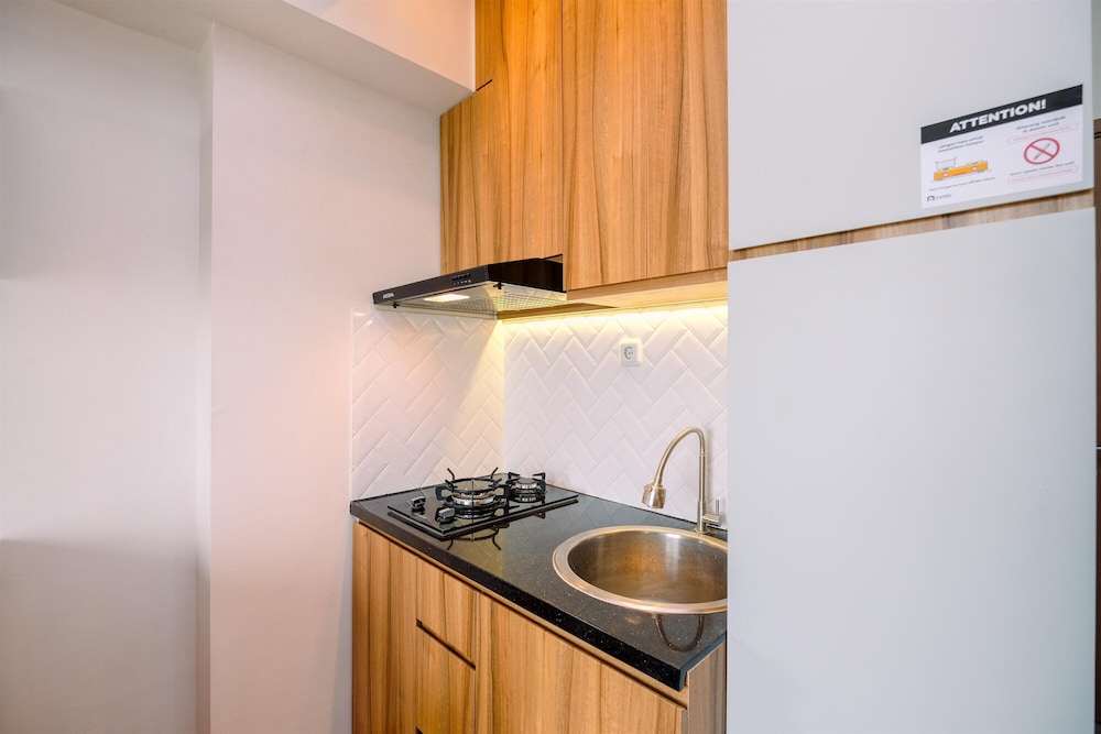 Best Homey and Comfort 2BR at Podomoro Golf View Apartment