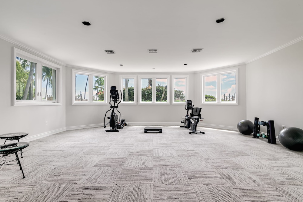 Waterfront Mansion With Game Room Gym Media Room and Guest House