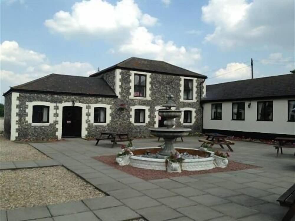 Hotel Coach House Hotel - Image 1