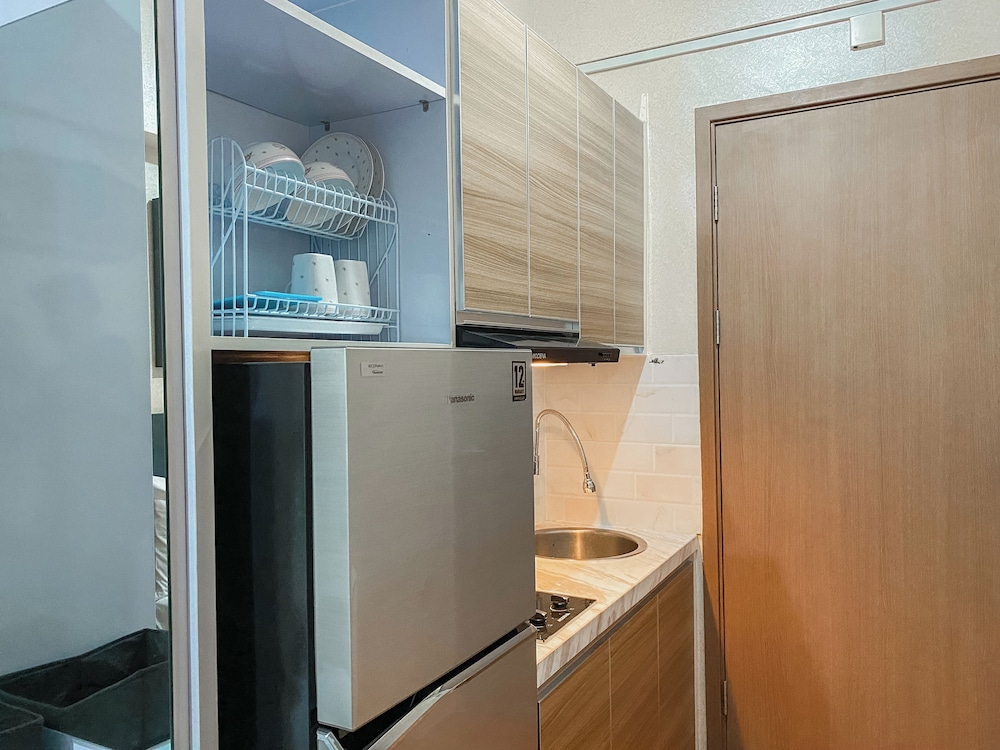 Warm and Homey Studio at Podomoro Golf View Apartment