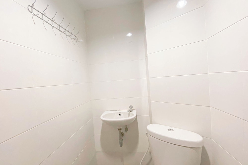 Simple White Studio Apartment At The Alton Semarang