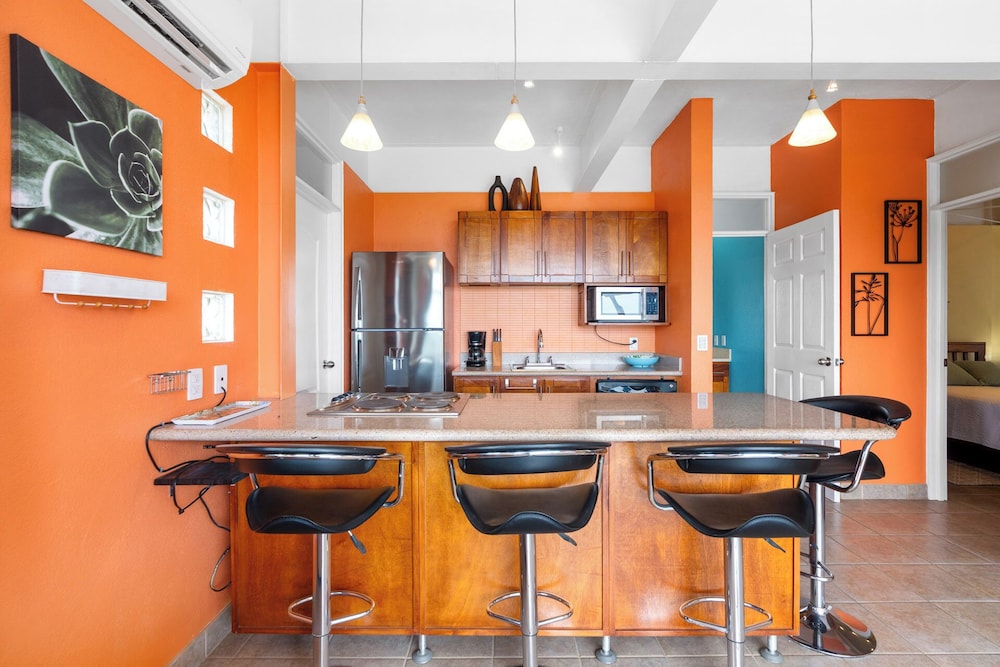 Modern Top-Floor Condo with Panoramic Views and Community Pool